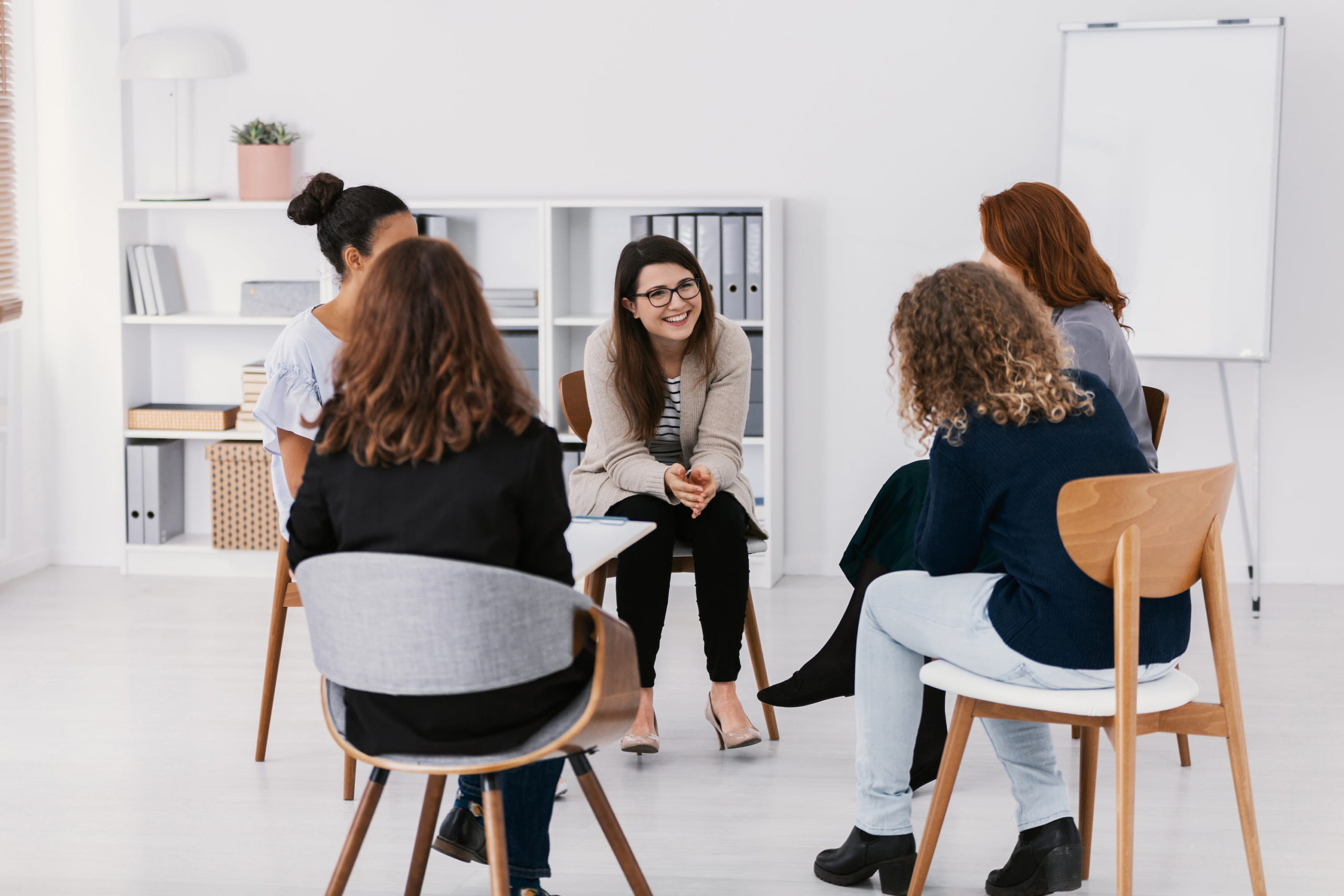 Sex therapy professionals sit and discuss sex addiction and couples therapy.