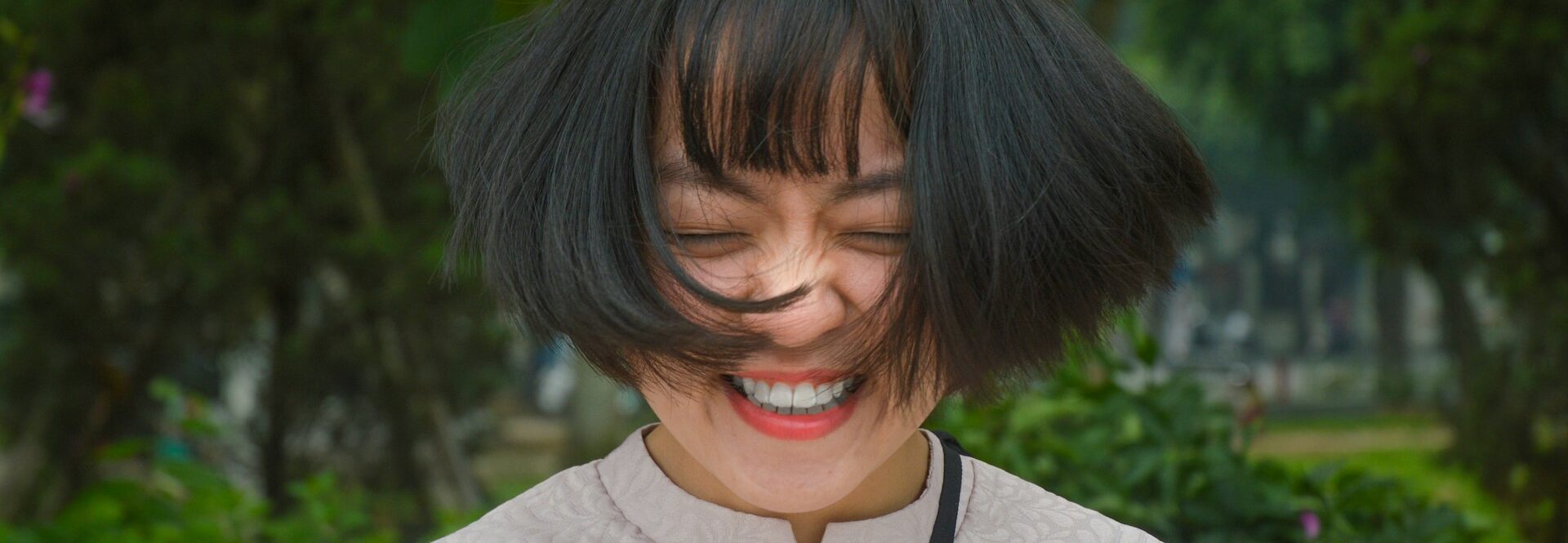 Woman smiles after sex therapy.
